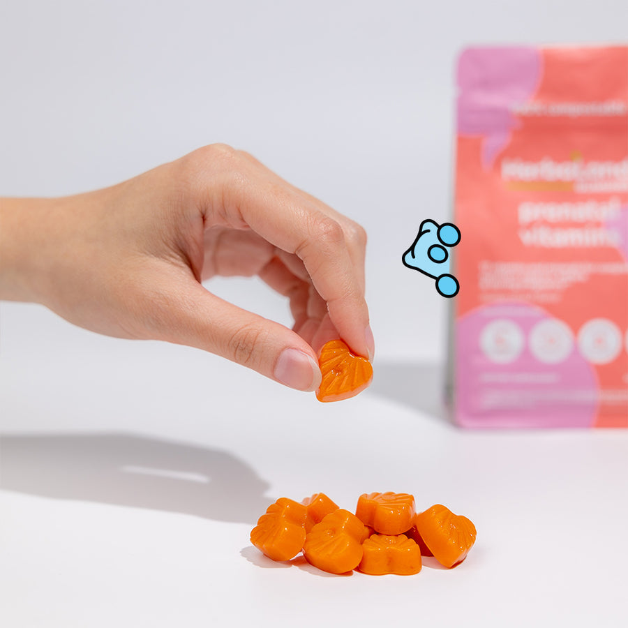 A picture of herbaland gummies with a pouch of prenatal vitamins to support during and after pregnancy with mango peach flavor