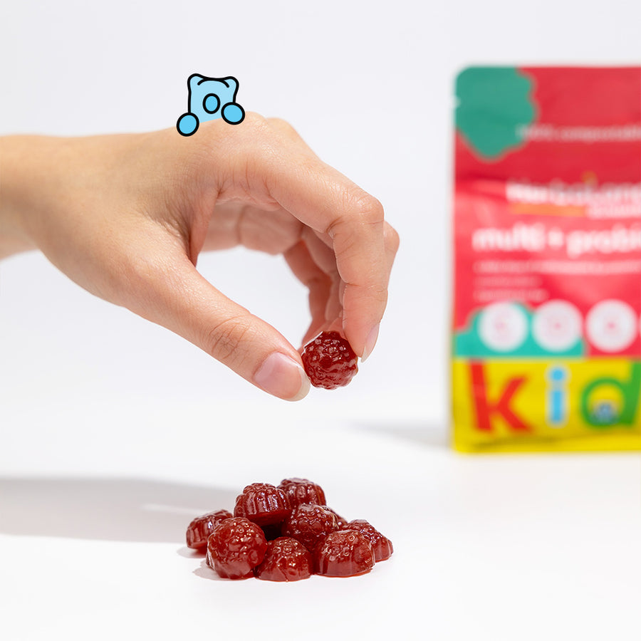 A picture of herbaland gummies with a pouch of multi+probiotics for kids with strawberry flavor